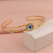 CHOKER DOBLE OJOS Y FLOR